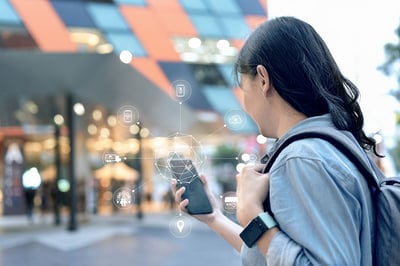 Person-using-phone_1278737734
